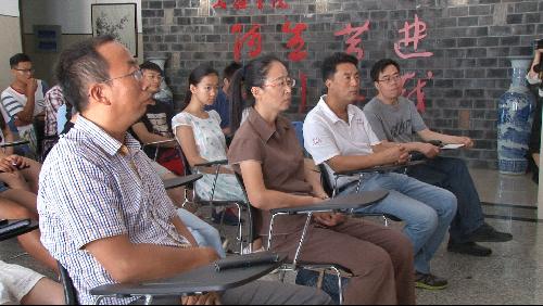 全院教职工与员工共同观看中国共产党成立95周年大会